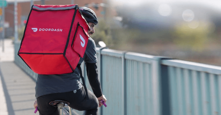 Man who works for Door Dash delivering food