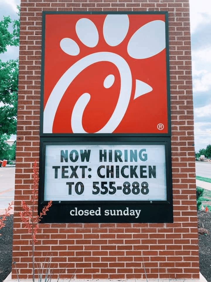 A Text to Apply example on a Chick-fil-a billboard