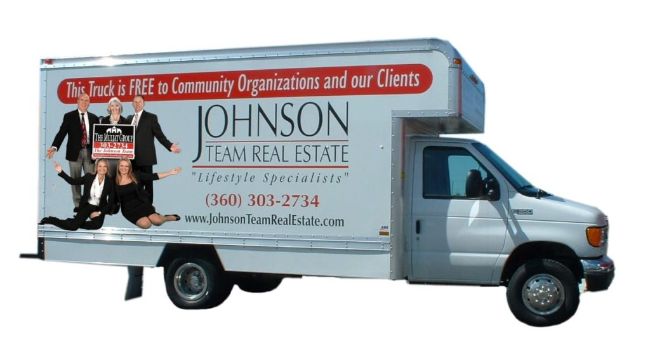 Moving truck sponsored by real estate company