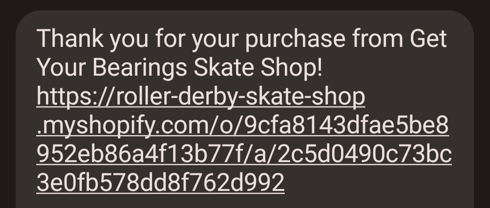 A confirmation text message from Get Your Bearings skate shop
