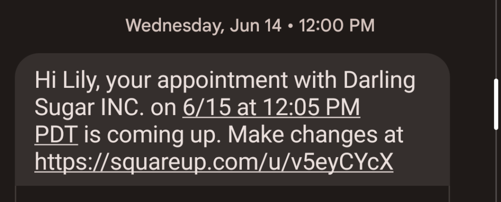 An appointment reminder SMS from Darling Sugar