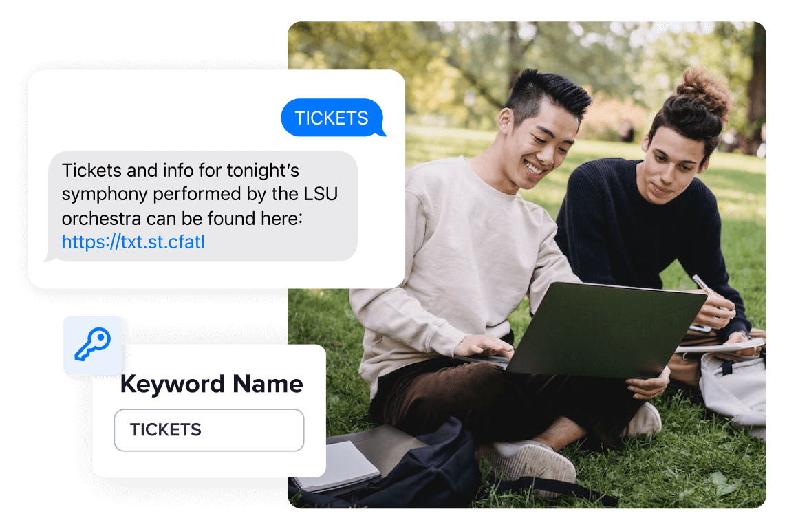Two students on a campus lawn create a text-to-join keyword, 'TICKETS'.