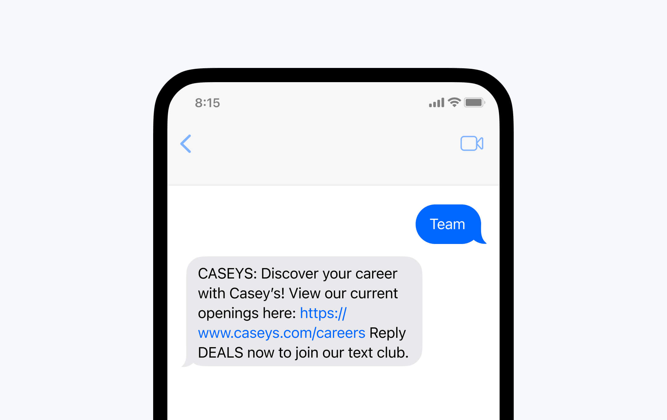 A screenshot of a smartphone messaging app displaying a text message bubble with the word 'Team' sent from the user. The reply bubble shows a message from CASEY'S, inviting the user to 'Discover your career with Casey's! View our current openings here: [link to Casey's career page] Reply DEALS now to join our text club.' This illustrates a 'text to apply for job openings' service via mobile messaging.
